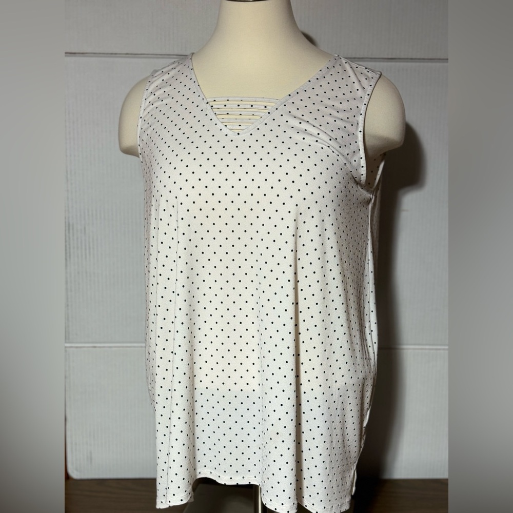 In every step 3X white/black polka dot tank. Wear under a black cardigan.